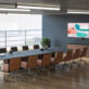 Conference table with presentation screens